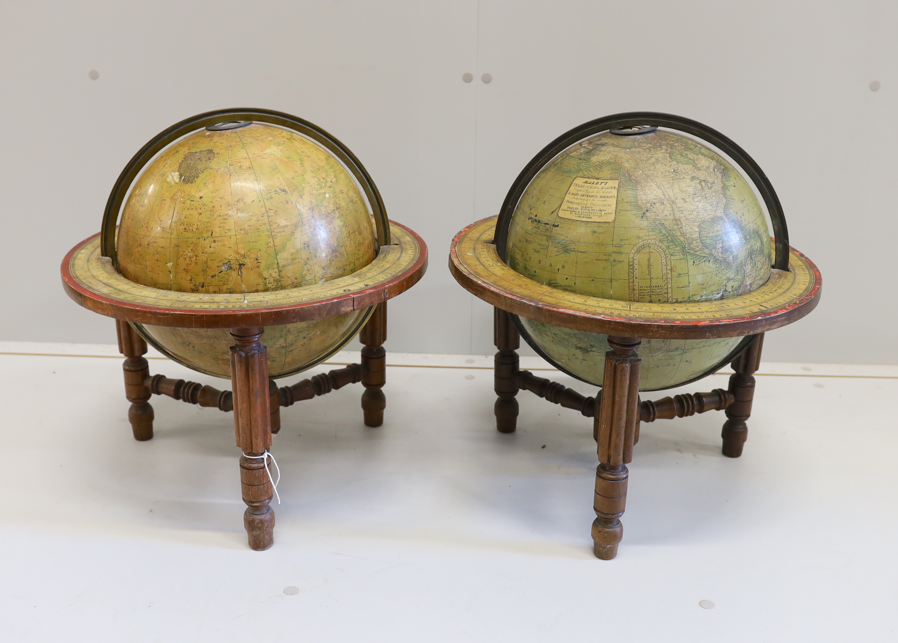 A pair of 19th century 12 inch table top library globes on stands by Malby
